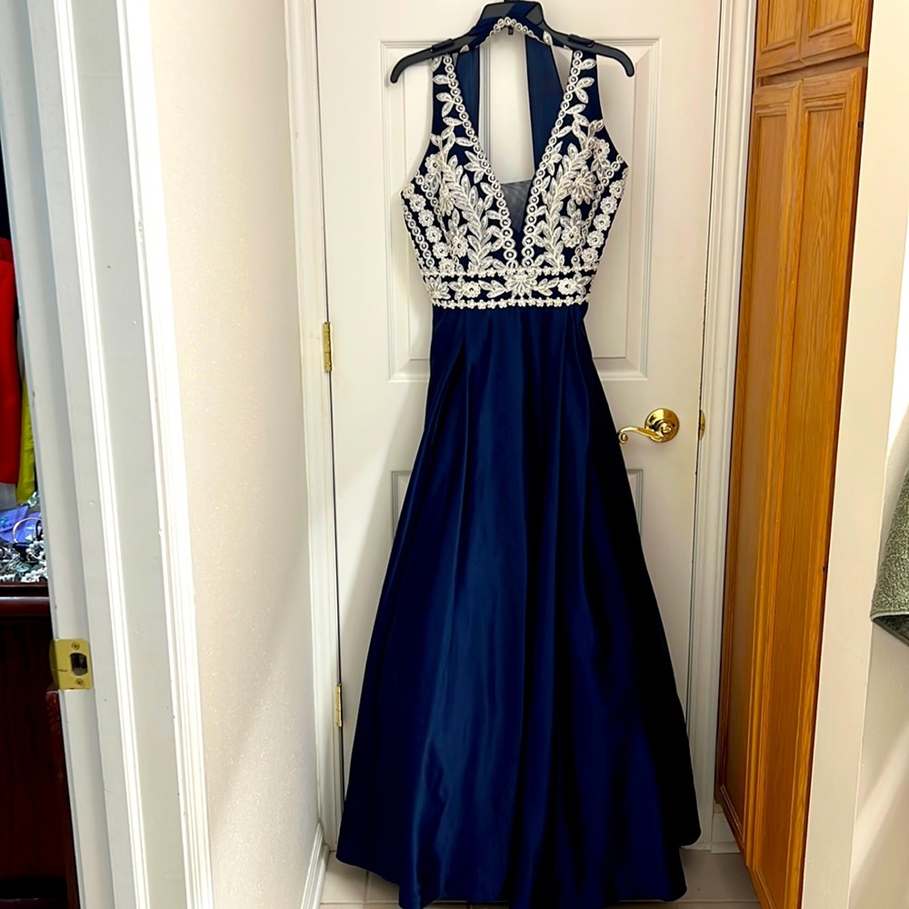 Beautiful, navy blue and sequin top prom style dress. Excellent condition.